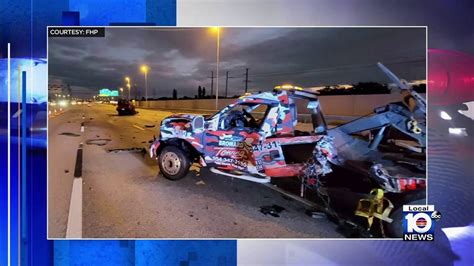 car hits tow truck on highway